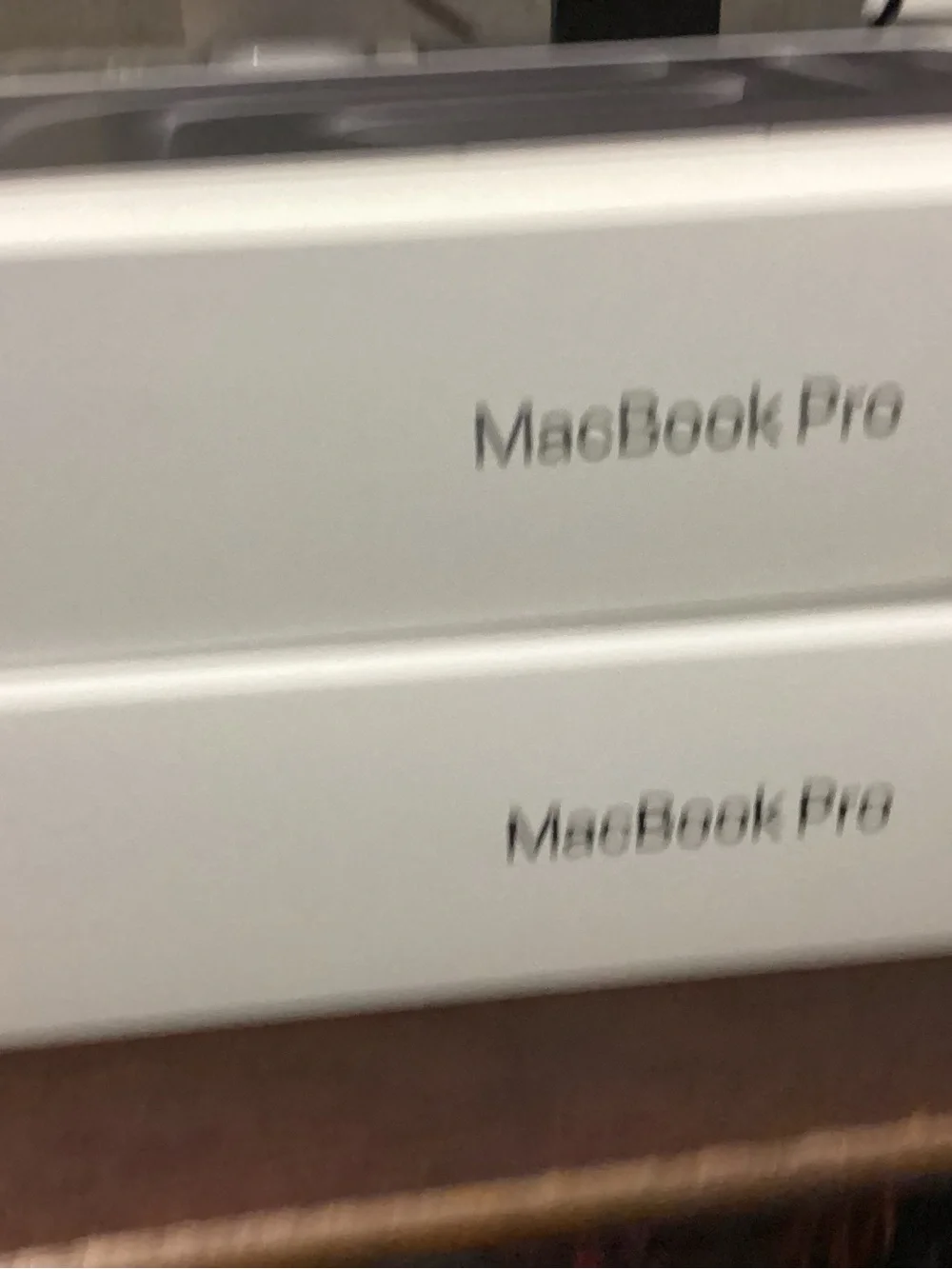 Apple MacBook Pro White Packaging with Black Text